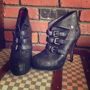 Black leather heel boots spikes skulls